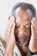 © Designpics - Close-up of a middle-aged man suffering from a headache