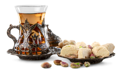 Wall Mural - Bronze plate with arabian sweets and tea. Ramadan Kareem.