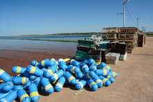 Lobster Traps And Buoys On The North Shore At North Rustico's Harbor.; North Rustico Harbor, North Rustico, Prince Edward Island, Canada.