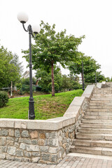 Wall Mural - view of beautiful park with steps and lamp