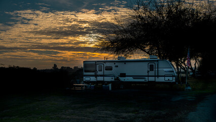 Wall Mural - Camping in trailer in winter under a beautiful sky