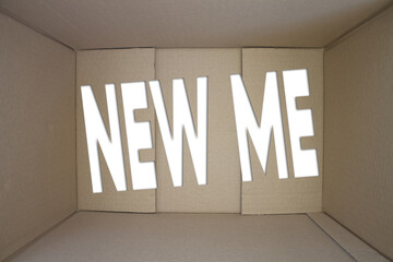 Poster - New Me word with cardboard box. Brown folded card box.