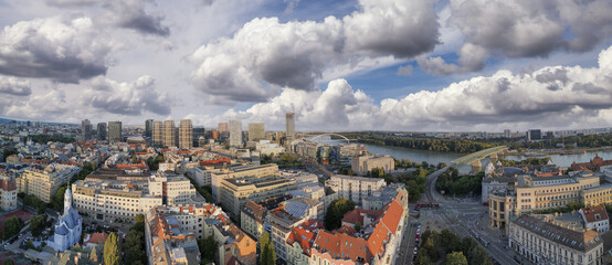 Wall Mural - Bratislava, Slovakia. Aerial view of city center at sunset. Panoramic viewpoint from drone