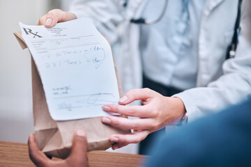 Pharmacy, prescription and hands for medication with doctor, patient or shopping for healthcare product. Closeup, nurse or pharmacist with customer for note, pills or paper bag for wellness in Sydney