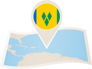 Sticker - Folded paper map of Saint Vincent and the Grenadines with flag pin of Saint Vincent and the Grenadines.