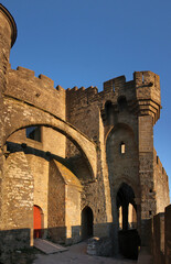 Wall Mural - Gate in the old city walls of Carcassonne close to the château comtal castle, Aude department in France