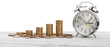 © BillionPhotos.com - Stack golden coins with alarm clock, Save  time money concept