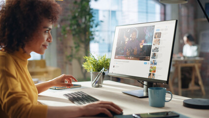Aufkleber - Middle Eastern Female Working in Creative Agency, Implementing Modern Business Strategy for Clients. Successful Specialist Using Computer, Watching Video about Cameras.
