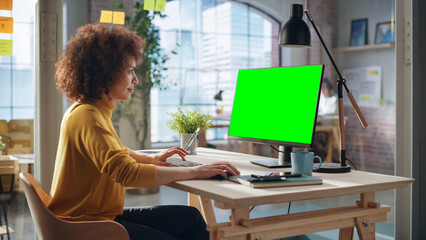 Aufkleber - Middle Eastern Female Working in Creative Agency, Implementing Modern Business Strategy for Clients. Successful Specialist Using Computer with Green Screen Mock Up Display.