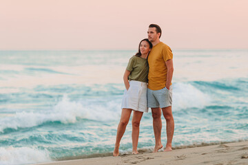 Young couple on the beach vacation on tropical island