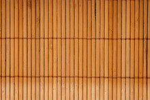 Brown Bamboo Texture Background Coming From Natural Bamboo Straws. The Oriental Asian Fencing Has A Beautiful Yellow Pattern, Fence Texture In Daytime