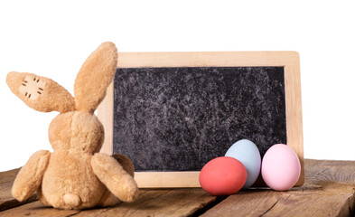 Wall Mural - Easter bunny and colored eggs on the desk