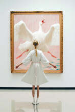 Vintage Elegant Young Woman In Museum In Front Of Pompous Swan Painting. The Lady Who Becomes A White Swan. Illustration, Generative AI.