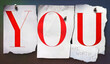 © Designpics - Cut out letters, YOU, pinned to wall