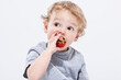 © Designpics - Boy Eating Strawberry