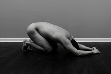 Nude Male Model In Yoga Poses Child Pose