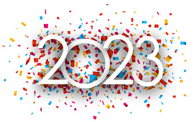 Wall Mural - White paper 2023 sign on colorful ribbon confetti background.