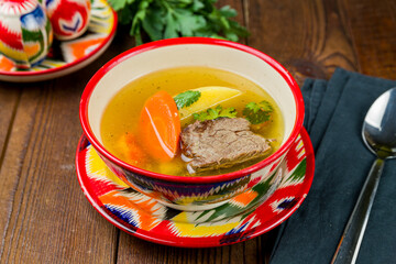 Poster - shurpa asian soup with beef on wooden table