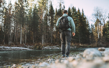 Canvas Print - man walking in forest