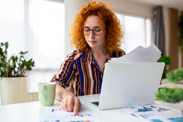 Businesswoman Sitting at Her Desk Working on Laptop Computer in Big City Office. Confident Social Media Strategy Manager Plan Disruptive e-Commerce Campaign