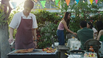 Wall Mural - Asian people in the summer party, grill, and roast pork.