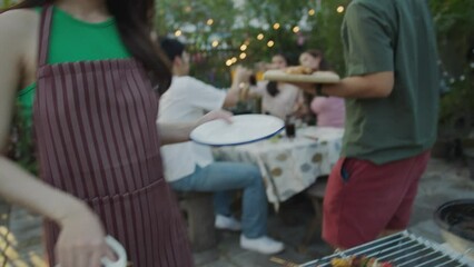 Wall Mural - Asian people in the summer party, grill, and roast pork.