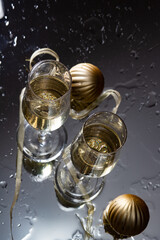 Poster - two champagne glasses reflecting in glass New Year background