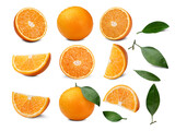 Fototapeta  - Set of whole and sliced oranges with leaves