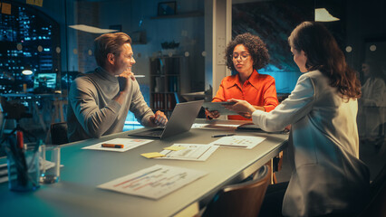 Poster - Positive Group of Managers Having a Team Meeting Long After Work Hours in the Night. Inspired Colleagues Discussing Annual Financial and Marketing Reports. Teamwork in Creative Office.