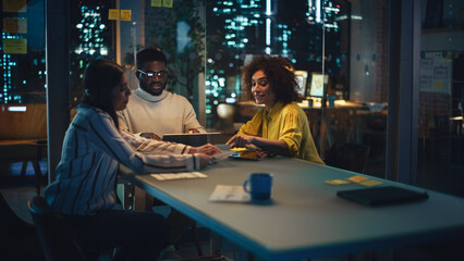 Aufkleber - Excited Diverse Team Celebrating a Corporate Win, High Five Each Other Around the Table. Group of Young Successful Businesspeople Making a Corporate Meeting in Conference Room in Creative Agency.