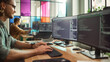 © Gorodenkoff - Male Programmer Coding on Desktop Computer With Two Monitors Set Up in Creative Office. Caucasian Man Using Artificial Intelligence to Create Innovative Software for Start-up Company.