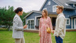 © Gorodenkoff - Young Couple Viewing Property for Sale, Talking with Professional Real Estate Agent Outside the House on a Summer Day. Young Beautiful Family are Ready to Become New Homeowners.