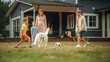 © Gorodenkoff - Joyful Young Couple with Kids, Playing Ball with an Energetic White Golden Retriever. Cheerful People Playing Football with Pet Dog on a Lawn in Their Front Yard in Front of the House.