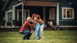 © Gorodenkoff - Grandfather and Grandmother are Happy to Meet Their Granddaughter in Front of their Suburbs House. Grandmother Hugging the Girl, Enjoying Family Time with Grandchild.