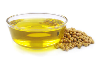 Wall Mural - Glass bowl with cooking oil and heap of soybeans isolated on white background