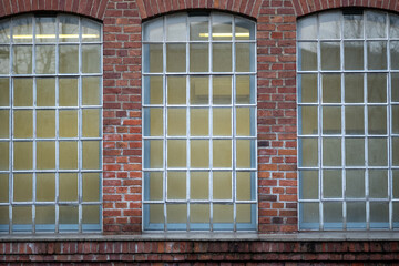 old window in a brick wall