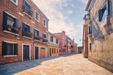 Italian Street With Colorful Buildings In Venice