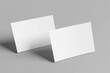 © graphicell - Blank white a6 postcard mockup with texture and shadow isolated on white background. 3d rendering