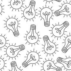 Wall Mural - hand drawn seamless pattern with randomly placed light bulbs on a white background.