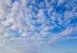 Blue sky with clouds background overlay. Ideal for sky replacement.
