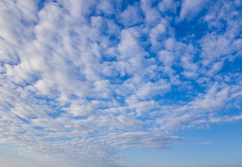 Wall Mural - Blue sky with clouds background overlay. Ideal for sky replacement.
