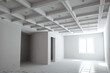 drywall construction and suspended ceiling in an unoccupied room in an apartment or home. White ceiling that extends in a complicated form. Generative AI