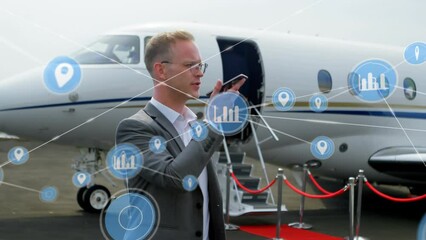 Poster - Animation of network of digital icons over caucasian businessman talking on smartphone at airport
