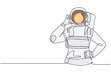 Poster - Single one line drawing female astronaut with call me gesture wearing spacesuits to explore outer space in search mysteries of universe. Modern continuous line draw design graphic vector illustration