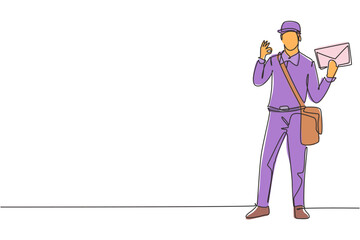 Poster - Continuous one line drawing postman standing in a hat, sling bag, uniform, holding envelope, and with gesture okay delivering mail to home address. Single line draw design vector graphic illustration