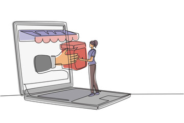 Poster - Single one line drawing young woman receives package box from large canopy laptop screen and hands it over. Digital delivery concept. Modern continuous line draw design graphic vector illustration