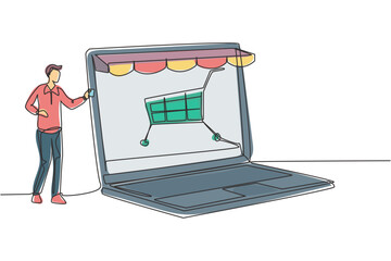 Poster - Single continuous line drawing young man inserting credit card into canopy laptop screen with shopping cart. E-shop, digital payment concept. Dynamic one line draw graphic design vector illustration