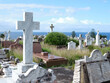 © Austockphoto - Cemetery with cross sculptures and grave stones