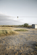 Lightbulb Hanging From Wire, Del Rio, Val Verde County, Texas, USA