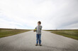 © Designpics - Boy Standing on Road